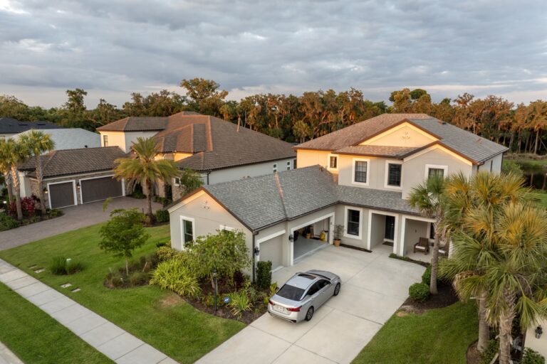 Aerial view of expensive residential houses in small town in southwest Florida. American dream homes as example of real estate development in US suburbs.