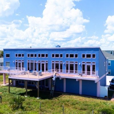 Exterior home coating beautiful bright blue and light pink