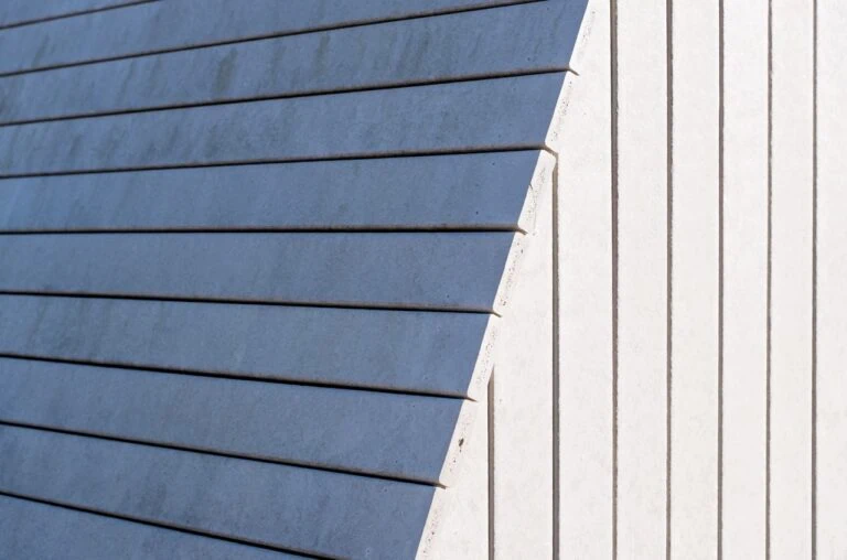White wooden wall with a shadow - vertical lines