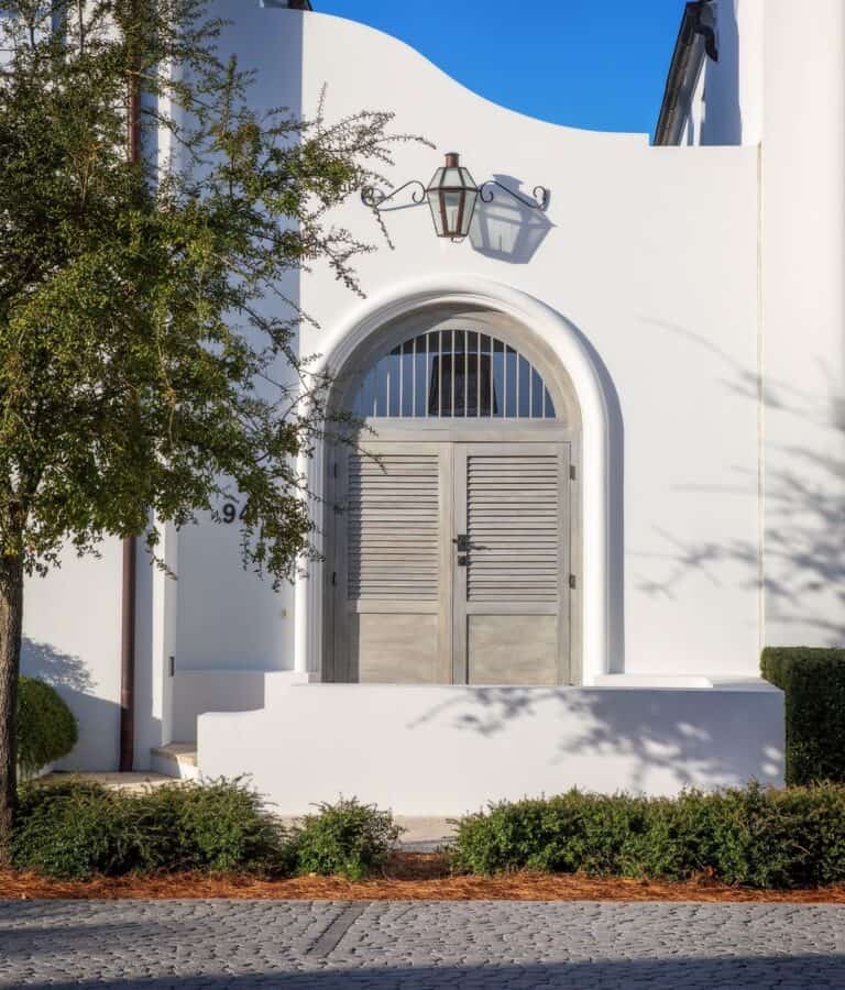 A scenic shot of the front door in a residential building in Alys Beach, Emerald Coast, Florida, USA