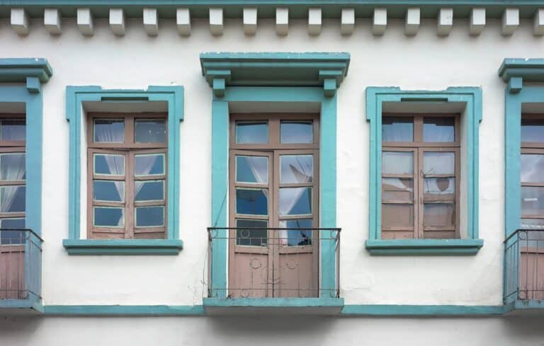 Street view of an old colonial building facade, Cuenca, Ecuador.